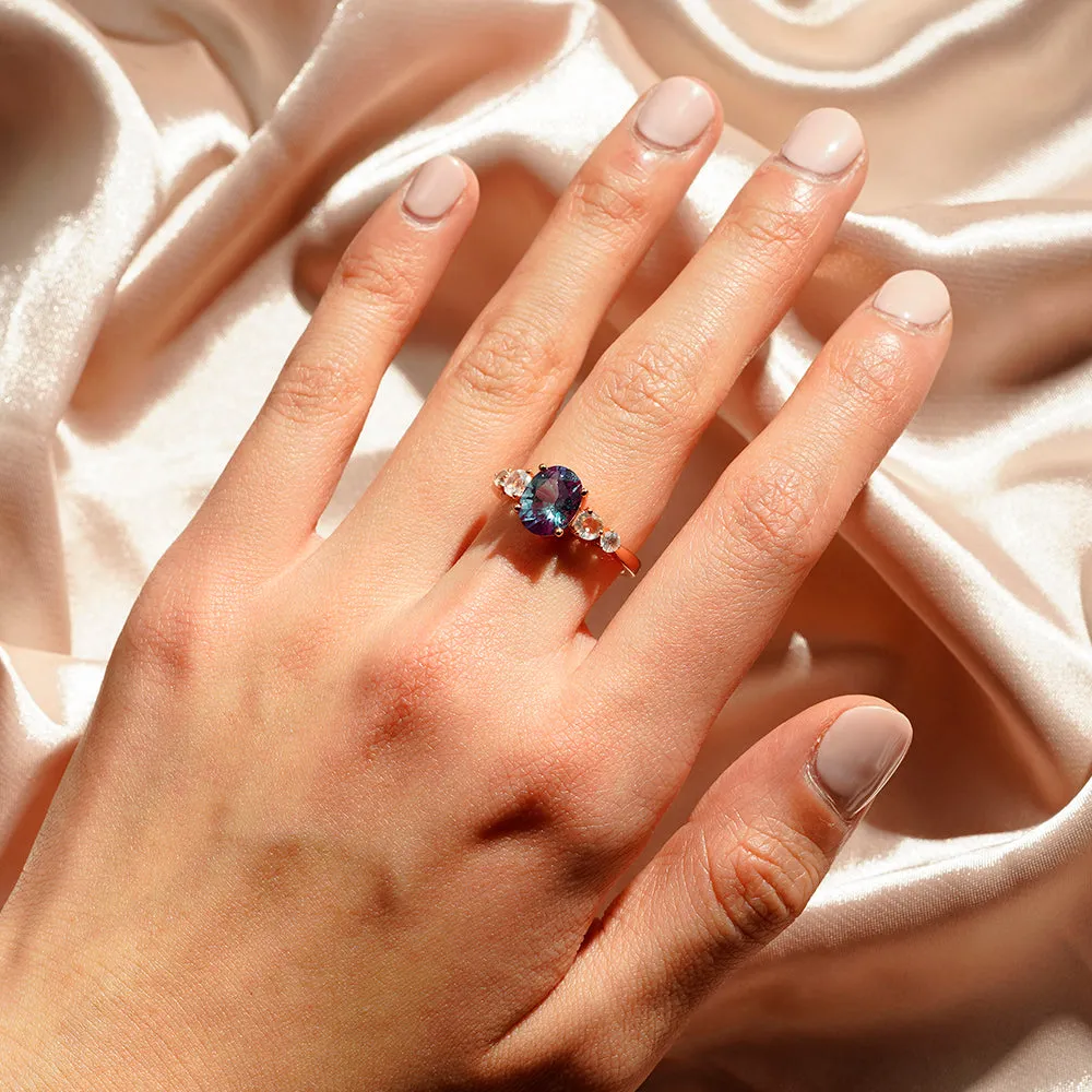 1.5 CT. Oval Alexandrite Engagement Ring With Moonstone Accents