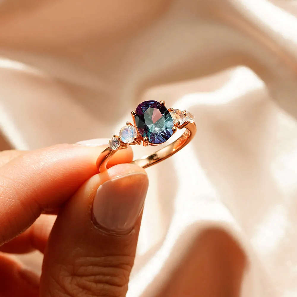 1.5 CT. Oval Alexandrite Engagement Ring With Moonstone Accents