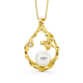 Freeform teardrop pearl and diamond pendant