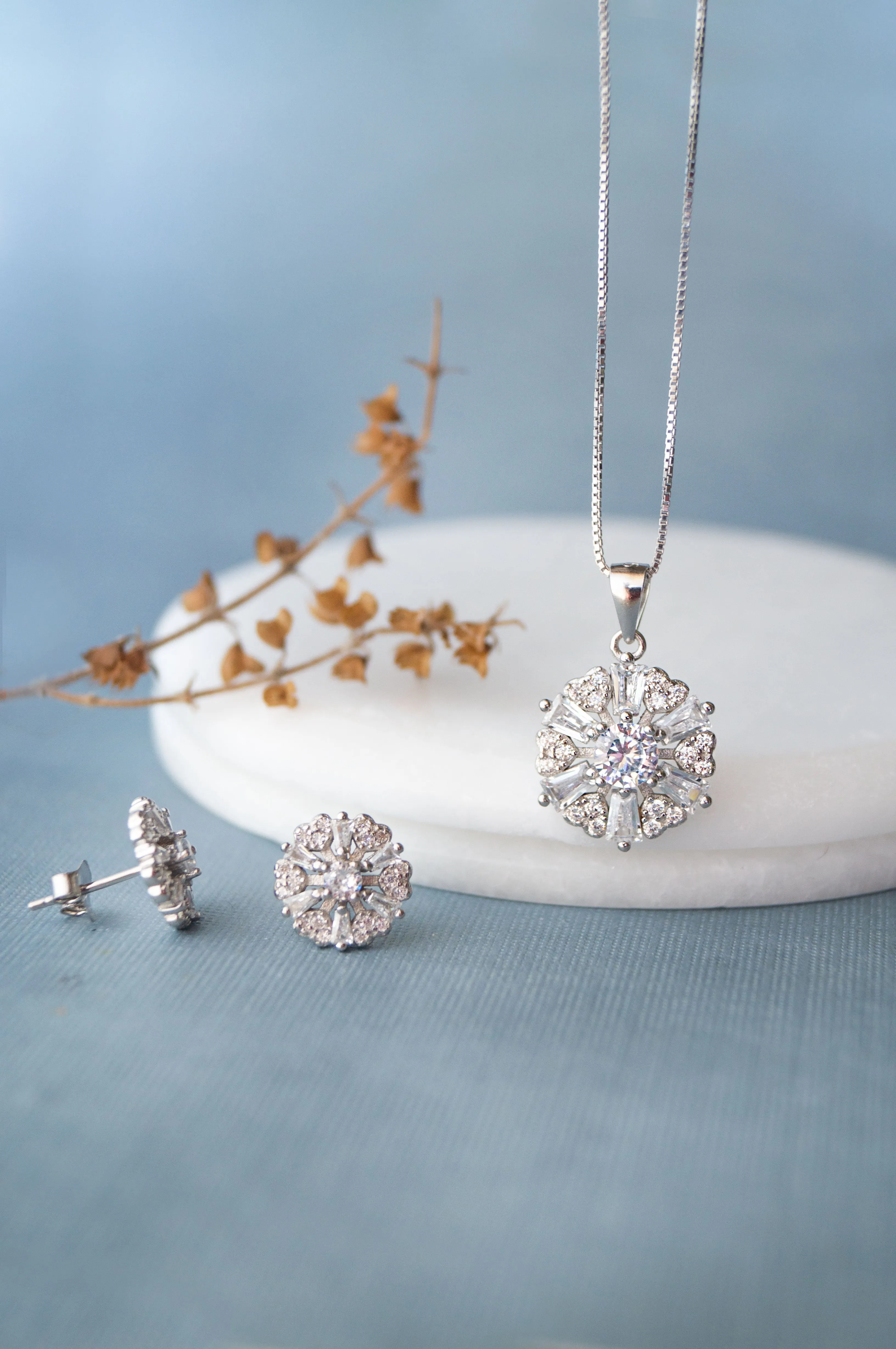 Radiant Floral Solitaire Sterling Silver Pendant Set